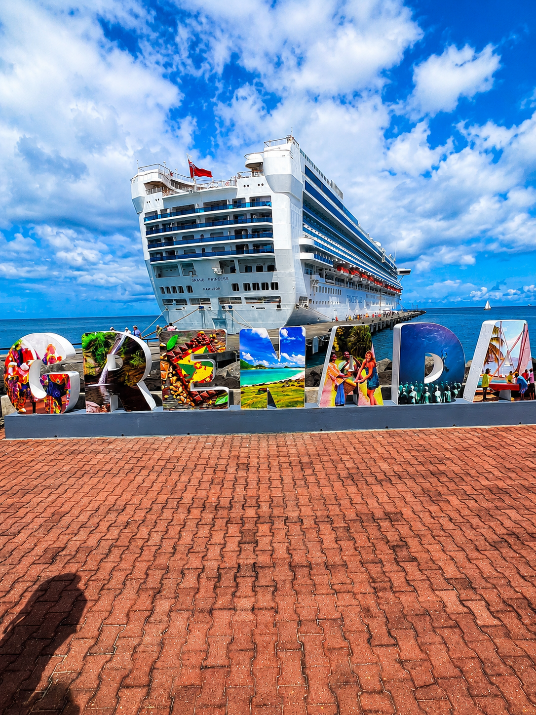 Grenada — Caribbean cruise ports, colorful island signs, and the spice isle's warm welcome from the moment you arrive.